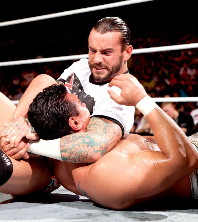 fishbulbsuplex:  C.M. Punk vs. Alberto Del Rio  That evil dominate grin on Punk!