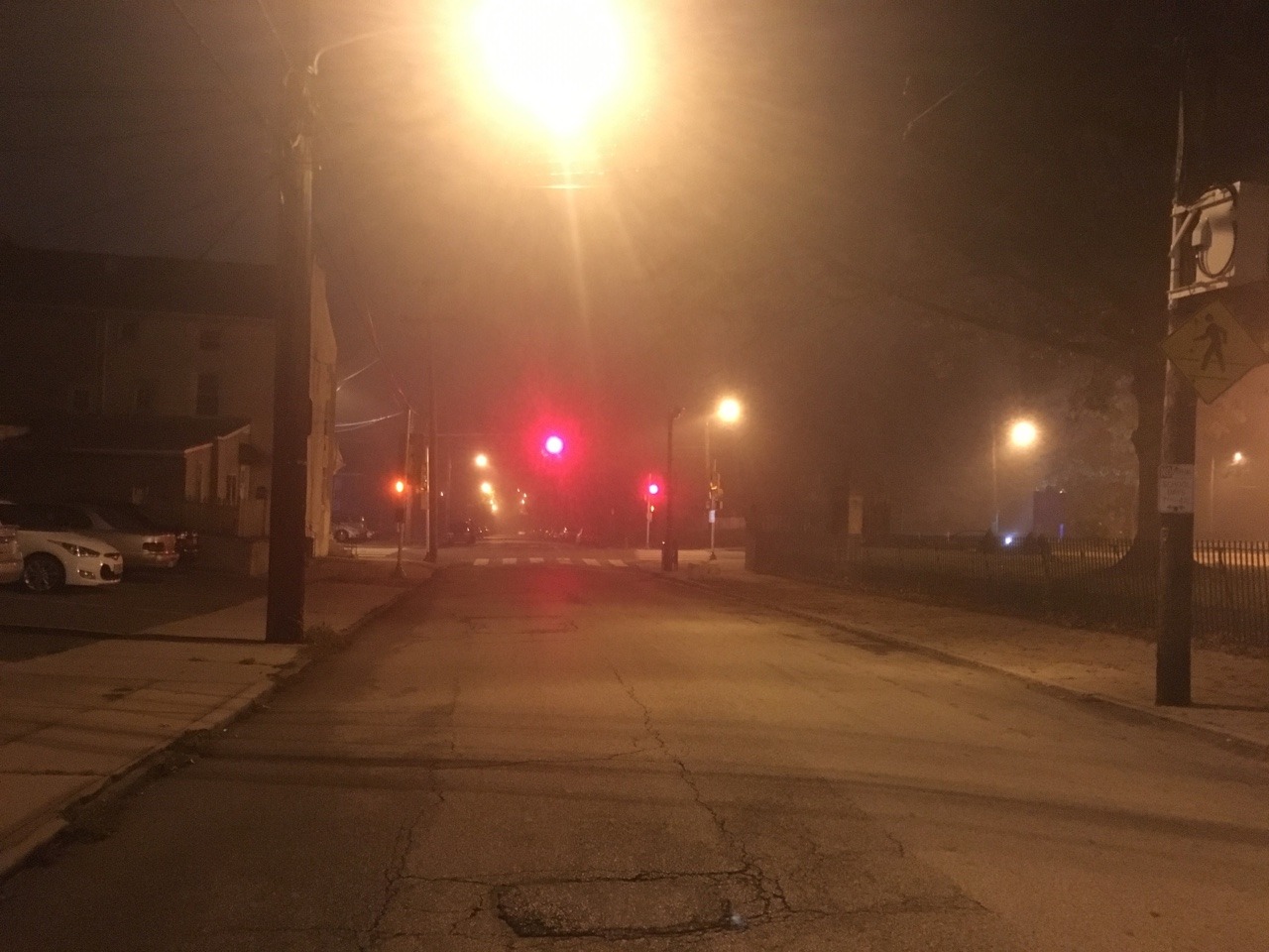 My street is creepy af at 2:09am. Not a soul in sight. Just the late night fog that
