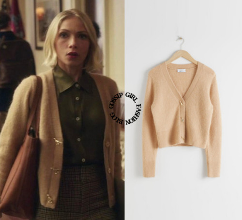 Who: Tavi Gevinson as Kate KellerWhat: And Other Stories Dinosaur Button Knit Cardigan - $99.00Where