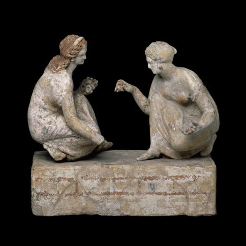 drakontomalloi:Anonymous Etruscan artist - Clay group with two girls playing knucklebones. Around 3r