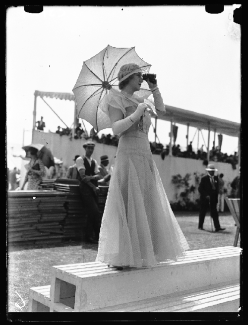 “Elegantly dressed spectator at Henley Royal Regatta, taken in July 1933 by Edward G Malindine