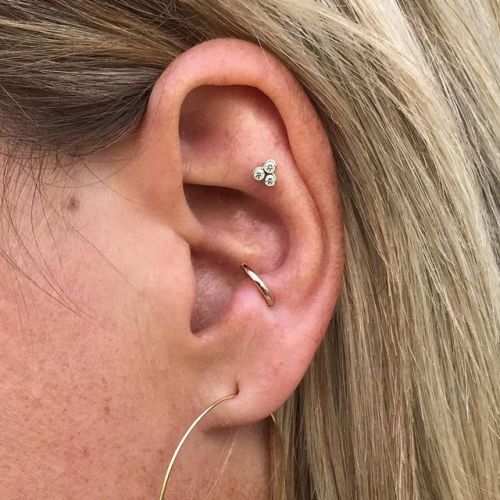 My client took amazing care of these anti-helix and anti-tragus piercings and they healed beautifull