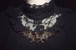snootyfoxfashion:  Bat and Moth Necklaces