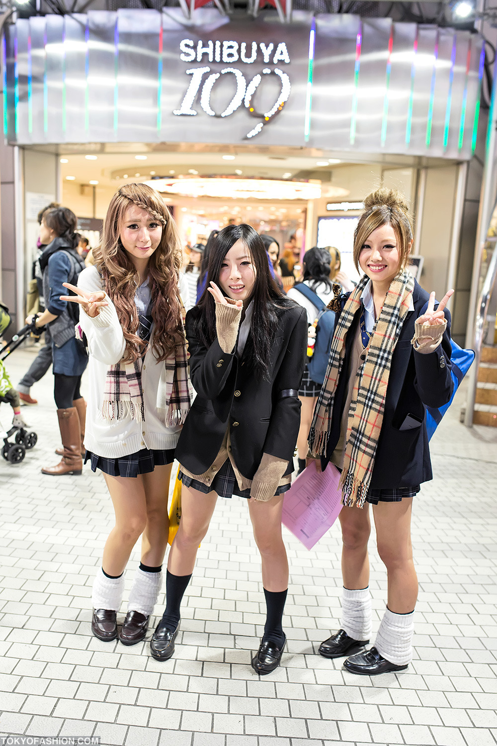 Japanese schoolgirls in loose socks in front of Shibuya 109 tonight!