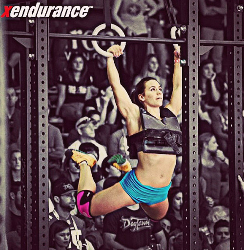 crossfitters:  Camille: Weighted muscle-up from the OCT 2014. Photo by Xendurance