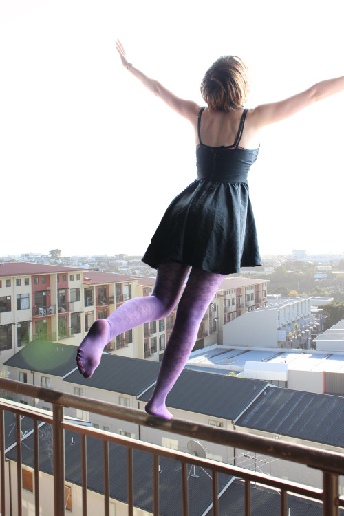 Opaque purple pantyhose and dress