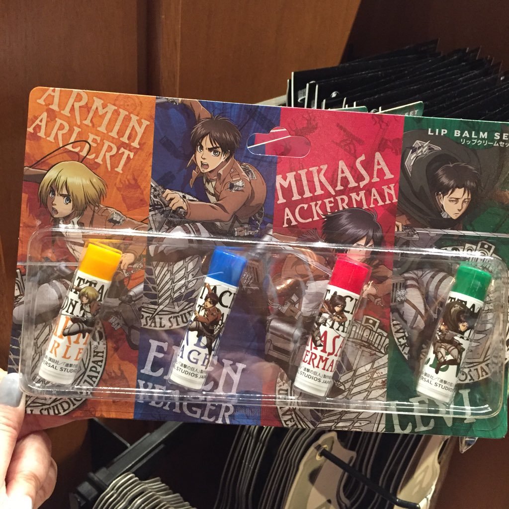 Armin, Eren, Mikasa, and Levi lip balm being sold at Universal Studio Japan’s SNK