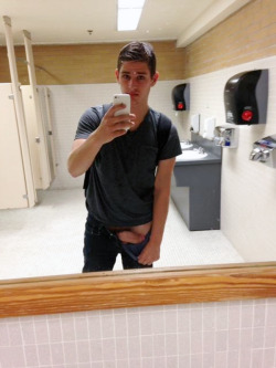 nakedpublicfun:  Exposing himself in the bathroom