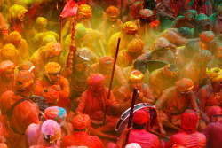 asylum-art:The Holi Colours Festival in IndiaEvery year in India, during the last full moon of the lunar month, takes place the Holi’s festival of colors, a national holiday in high emotion which marks the end of winter. Several photographer of AFP