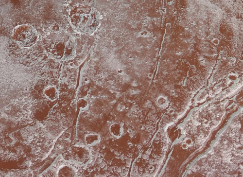 theverge:NEW PLUTO IMAGES SHOW DIRTY WATER “ICEBERGS” FLOATING IN NITROGEN