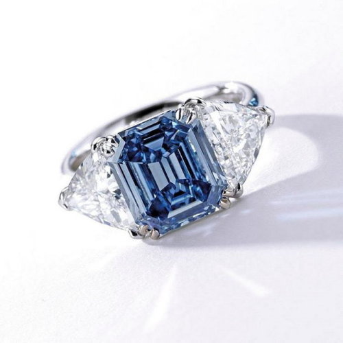europesroyals: gemville: 3.32 Carat Fancy Vivid Blue Emerald Cut Diamond and Trillion Cut White Diam