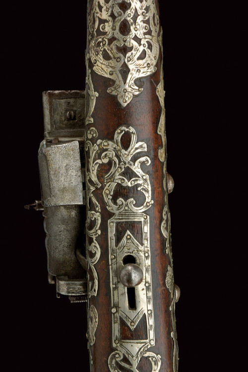Ornate Turkish miquelet tufenk mounted with silver and red coral, 19th century.