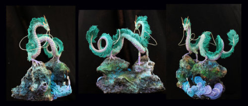 idiosyncrasique-x:  Gorgeous sculpture of Haku in his dragon form from Miyazaki’s Spirited Away, by DemiurgusDreams on Etsy.  And I love the little No Face in the waves :3 