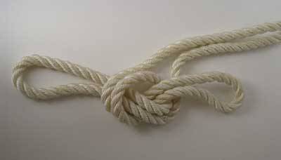 dare-master:   Rope Handcuff Start by making two loops in your rope, each about 10 inches long. Cross the left loop over the right creating a third loop in the center. Thread the loop that is now on the right through the new center loop creating a knot.