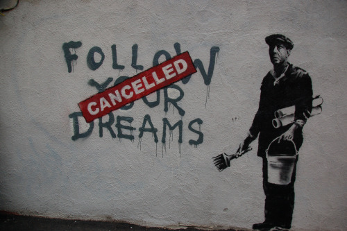 optates:  Banksy, a street artist whose identity remains unknown, known for his provocative stenciled pieces in the late 1990s.  