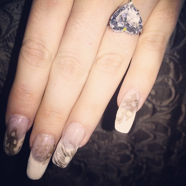 gagasgallery: @ladygaga: After the feathers are trimmed its more wearable, but amazing