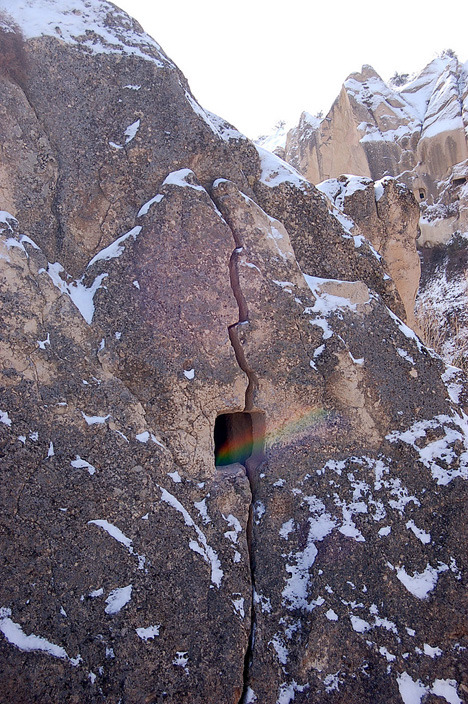 Rainbow and Cracked “Fairy Chimney”  The region of Cappadocia (Capadokya) is located in central Turkey, and is the setting for one of the strangest landscapes in the world. The deep valleys and soaring rock formations are volcanic rock formati