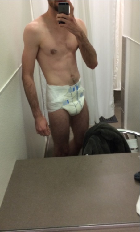 postcollegedl:  Putting on a diaper at the adult photos