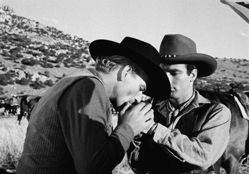 jacquesdemys:Montgomery Clift gives John Wayne a light in Red River (1948)