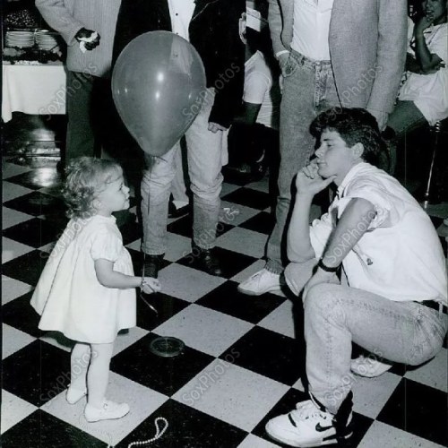An ADORABLE picture of @SeanAstin and a little girl in 1989