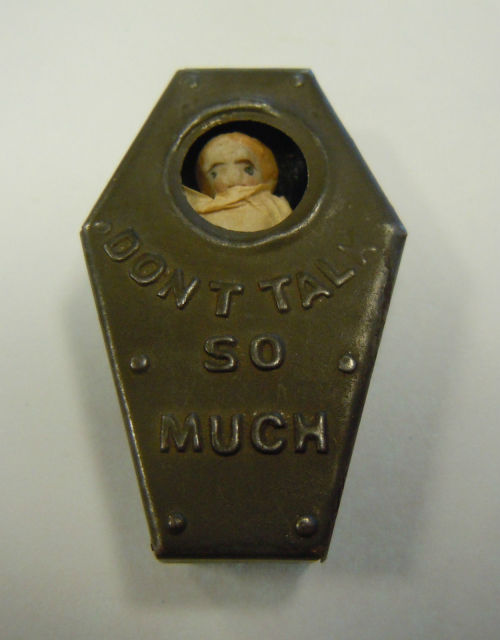 hazedolly:This is a curious one: an antique miniature all-bisque “frozen Charlotte” doll in a little