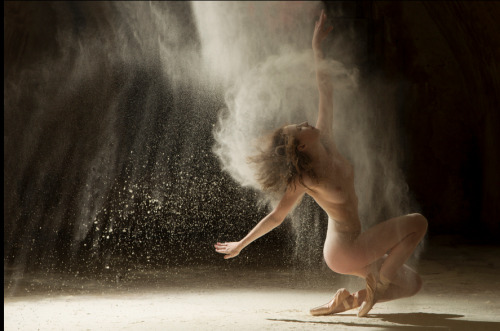 adventuresinhires:  Poussière d’étoiles (Stardust) is a series produced by the French photographer Ludovic Florent. It showcases dancers brimming with adding flour. Sand grains accentuate the majestic movement choreography. 