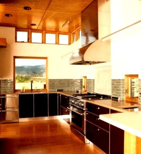Contemporary Kitchen - PantryExample Of A Large Trendy L-shaped Cork Floor Kitchen Pantry Design With