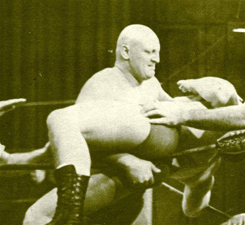 turnbucklesmash:  Killing two birds with one stone.  Setting him up inside the turnbuckle,