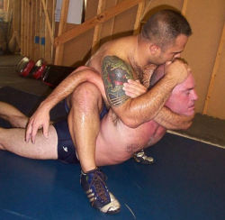 wrestle-me:  Two sweaty wrestlers tangled