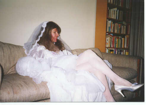 This beautiful bridal crossdresser is also named Selena.