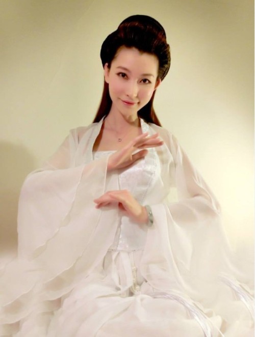 chinkqueen-li:  I get horny everytime wearing traditional chink dress, who wants to get off my clothes and help me out?