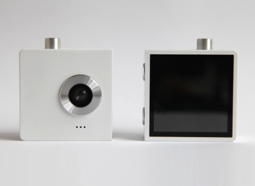 kateoplis:  The ‘duo’ camera splits in half and has synchronized triggers for taking the images of both photographer and subject simultaneously.  Oh, good grief.