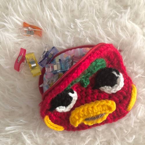 retrogamingblog2: Crochet Animal Crossing Pouches made by SunnyStitchery [ID: There are 5 images fe
