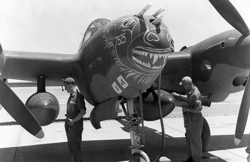 Ground crew refuel a P-38 in Tunisia, 1943