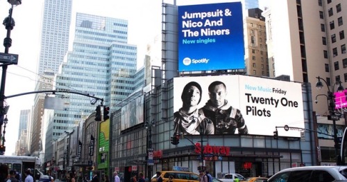 just two bros chillin’ on a billboard