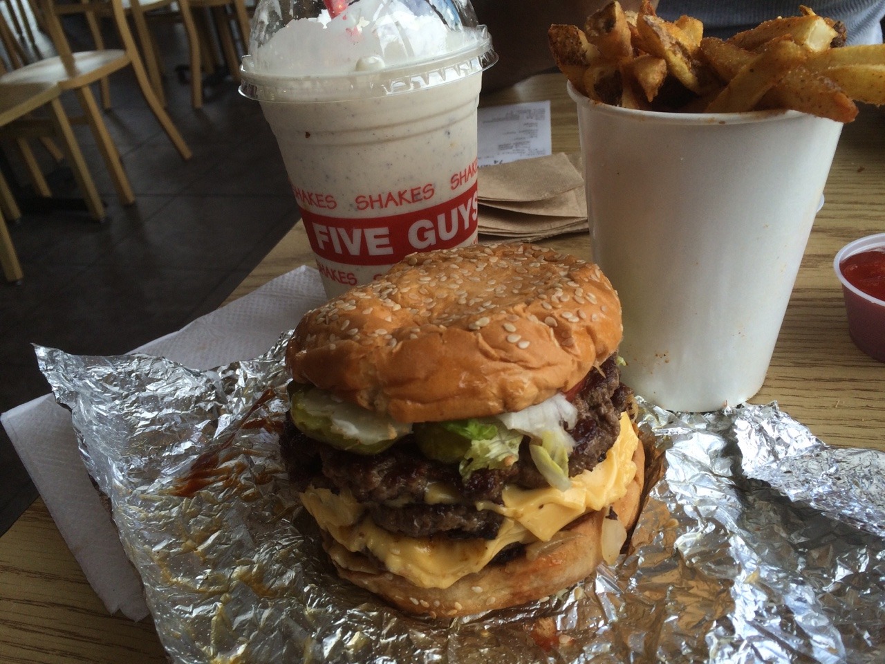 blasian-aesthetics:  Post workout meal. Five guys Bacon triple cheeseburger, cajun