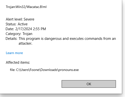 A Windows Defender popup listing a trojan named Win32/Wacatac.B!ml in pronouns.exe