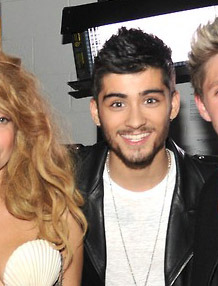 harrycmon:  omg look at zayns face while hes standing next to lady gaga  have you ever seen that boy smile so big 
