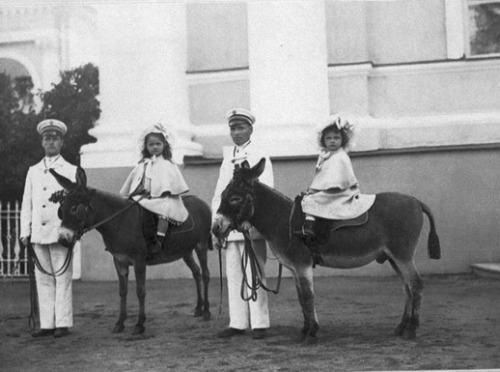  Grand Duchesses Olga and Tatiana Nikolaevna Romanov as toddlers ridding donkeys. 1899. 