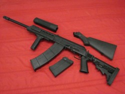 gunrunnerhell:  Saiga 12 Over the couple years on this blog, I’ve posted several Saiga 12’s; some converted, some not. This one is an “in-between”. The pistol grip + stock combo attaches to the rear of the receiver, essentially bypassing the work