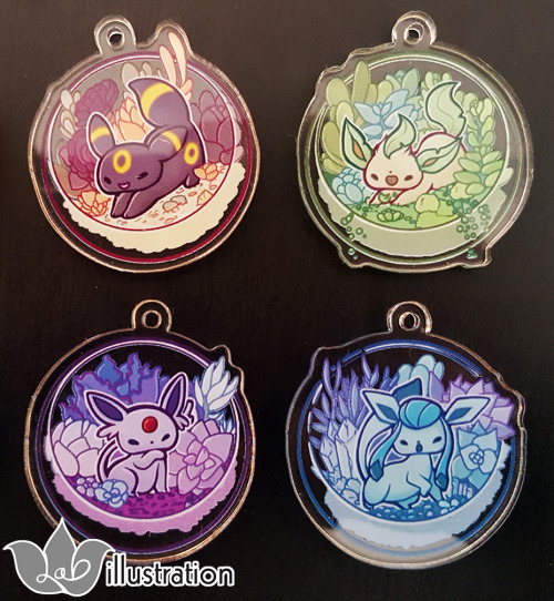 labillustration:They finally came in!! My Eevee terrarium charms came out so pretty from @acornpress! They looked like little jewels together. I will be selling these at Otakon, and on my Etsy as well! OMG these are awesome! OwO