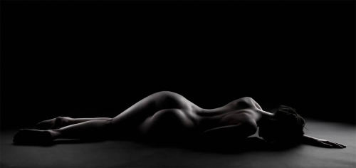 Joel Bloch presents us with a dark and passive vision of the female body.DARK II