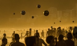 inothernews:  People play football at sunset on Ipanema Beach in Rio de Janeiro, Brazil.  (Photo: Yasuyoshi Chiba / AFP-Getty via The Guardian)