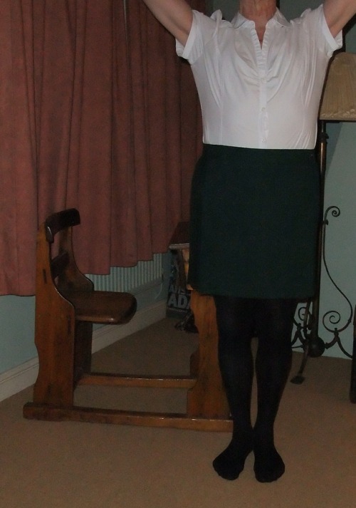 Hands on Head - Bottle green school uniform and black tights  for Jennifer on this discipline v