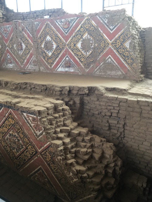 Decorative painting depicting Ai Apaec on adobe brick walls, The Temple of the Moon, Trujillo, Peru,