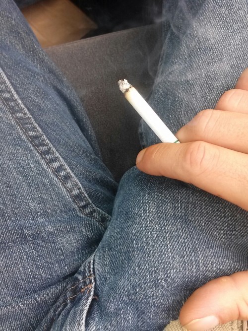 tattootodd80:  Smoking and squeezing my cock in the parkinglot