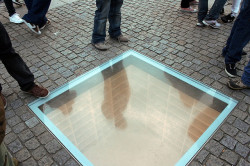 thefingerfuckingfemalefury:  hallowshorror:  anotherlgbttumblr:  kp-ks:  Book Burning Memorial ‘In the center of Bebelplatz, a glass window showing rows and rows of empty bookshelves. The memorial commemorates the night in 1933 when 20,000 “anti-German”