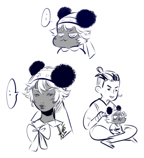 c2oh:  what a nerdy hairdo wit the hair wings