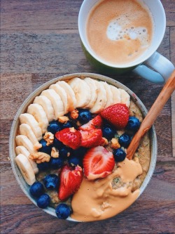 aspoonfuloflissi: Oats cooked in soy milk topped with banana, blueberries, strawberries, peanut butter, crushed walnuts and maple syrup + coffee on the side :) Running a 10k race this afternoon and I haven’t been this nervous before a race in a long