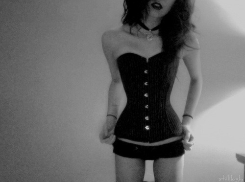 secretdaddy:  xsybilx:  There is something so sexy about a girl in a corset.  Roger